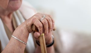 Old,Wrinkled,Woman,Hands,Holding,Walking,Stick
